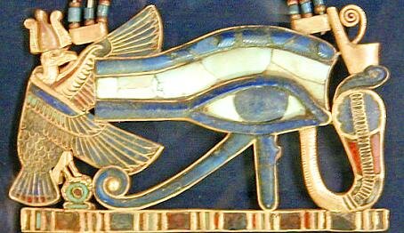 Gold wadjet eye pendant - the eye of Horus, incorporating Nekhbet the vulture goddess (left) and Wadjet the cobra goddess on the right.